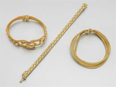 Lot 937 - Three Gold Bracelets