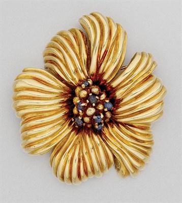 Lot 215 - Gold and Cabochon Sapphire Flower Brooch