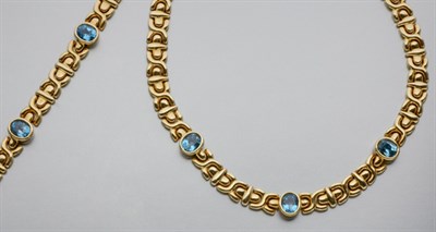 Lot 416 - Gold and Blue Topaz Necklace and Bracelet