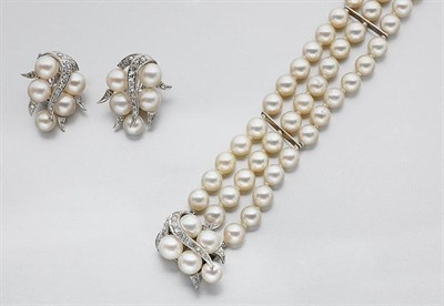 Lot 612 - Triple Strand Cultured Pearl Bracelet and Pair of Earclips