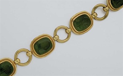 Lot 230 - Gold and Cabochon Tourmaline Intaglio Bracelet