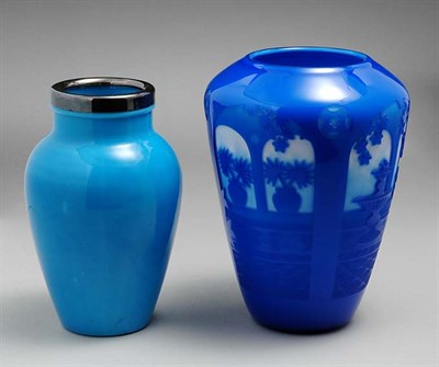 Lot 503 - Two Glass Vases Comprising a blue and white...