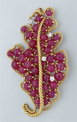 Lot 50 - Gold, Cabochon Ruby and Diamond Leaf Brooch