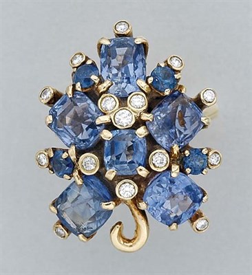 Lot 256 - Gold, Sapphire and Diamond Cluster Ring