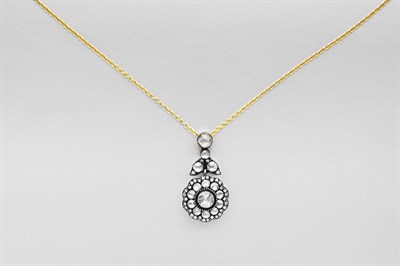 Lot 23 - Diamond Pendant with Gold Chain