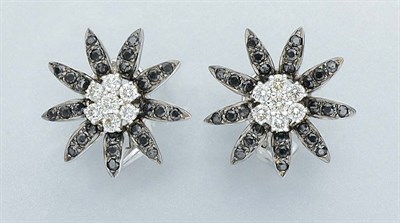 Lot 136 - Pair of Black Diamond and Diamond Flower Earrings