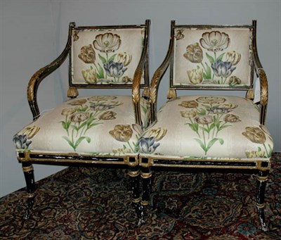 Lot 3704 - Pair of Regency Style Black and Gold Painted...