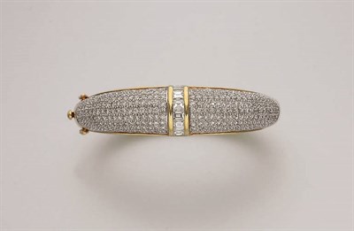 Lot 211 - Two-Color Gold and Diamond Bangle