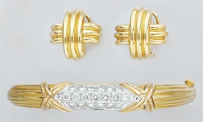 Lot 86 - Gold and Diamond Bangle and Pair of Gold Earrings
