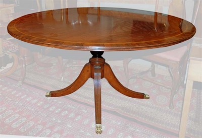 Lot 4139A - Regency Style Banded Mahogany Circular Dining...