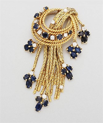 Lot 320 - Gold, Sapphire and Diamond Fringe Clip