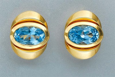 Lot 143 - Pair of Gold and Blue Topaz Earclips