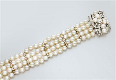 Lot 182 - Four Strand Cultured Pearl and Diamond Bracelet