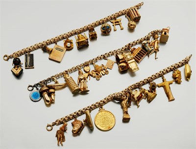 Lot 2691 - Three Gold Charm Bracelets