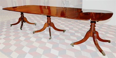 Lot 218 - Regency Style Mahogany Triple-Pedestal Dining...