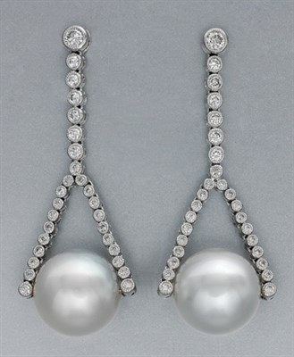 Lot 217 - Pair of Cultured Pearl and Diamond Pendant-Earrings