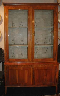 Lot 1504 - Continental Neoclassical Walnut Bookcase...