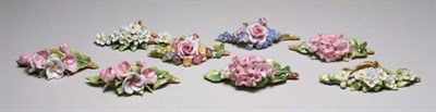 Lot 4293 - Set of Twelve Flower Decorated Porcelain Place...