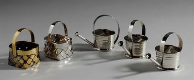 Lot 4680 - Three Cartier Silver Miniature Watering Cans...