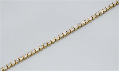 Lot 394 - Gold and Diamond Bracelet