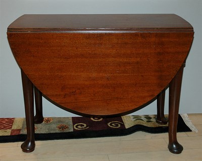 Lot 488 - Queen Anne Style Mahogany Drop-Leaf Table...