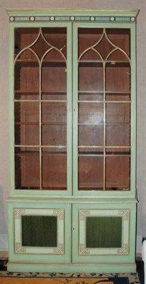Lot 387 - Neoclassical Style Green Painted Bookcase...