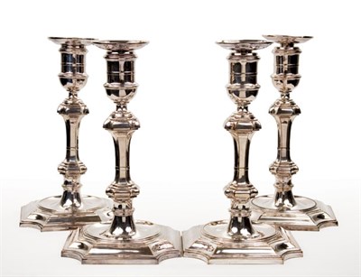 Lot 1214 - Set of Four English Silver Plated Candlesticks...