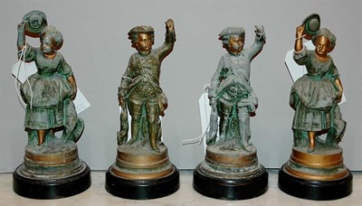 Lot 332 - Two Pairs of Green and Gold Painted Spelter...