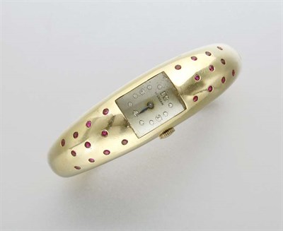 Lot 2573 - Gold and Ruby Watch-Bangle