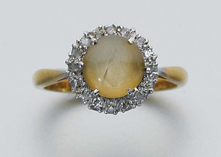 Lot 233 - Cat's Eye and Diamond Ring