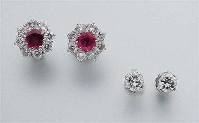 Lot 242 - Pair of Diamond Stud Earrings and Ruby and Diamond Stud Earrings