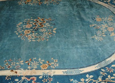 Lot 1639 - Chinese Oval Carpet China, circa 1900 The sky...