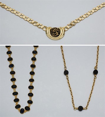 Lot 2203 - Four Gold Necklaces