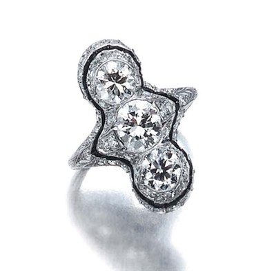 Lot 587 - Diamond and Black Onyx Ring