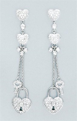 Lot 360 - Pair of White Gold and Diamond Heart and Locket Pendant-Earrings