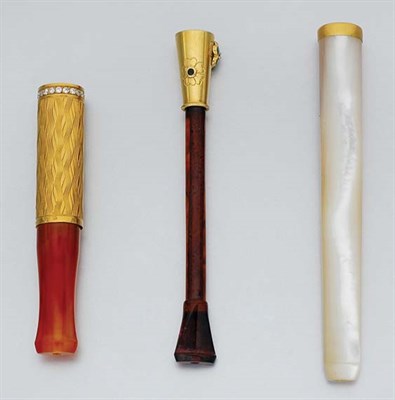 Lot 190 - Three Gold, Diamond, Gem-Set and Mother-of-Pearl Cigarette Holders