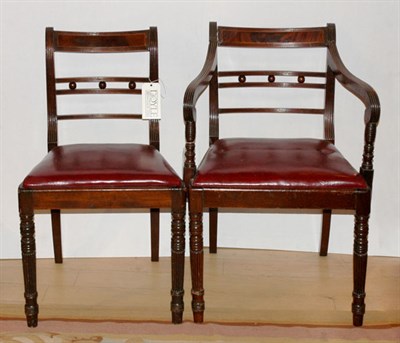 Lot 166 - Set of Fifteen Regency Style Mahogany Dining...