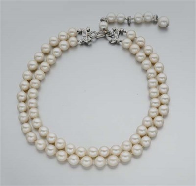 Lot 214 - Double Strand Cultured Pearl and Diamond Necklace