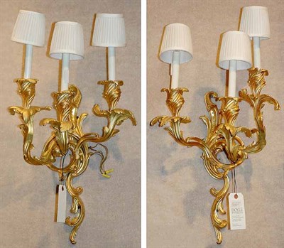 Lot 3604 - Pair of Louis XV Style Gilt-Bronze Three-Light...