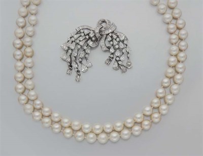 Lot 157 - Diamond Bow Brooch with Double Strand Cultured Pearl Necklace Attachment