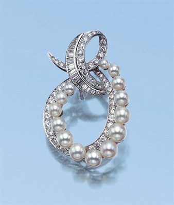 Lot 559 - Diamond and Cultured Pearl Bow Brooch