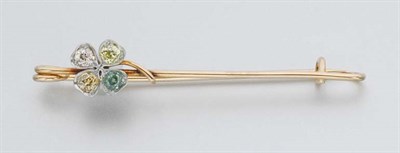 Lot 399 - Gold, Platinum, Fancy Intense Green Diamond and Yellow Diamond Clover Safety Pin Brooch