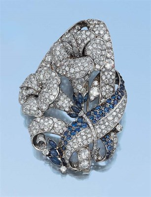 Lot 606 - Diamond and Cabochon Sapphire Flower Brooch
