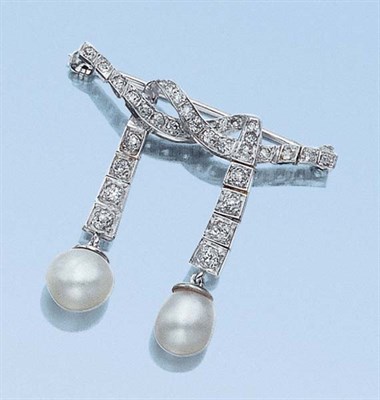 Lot 556 - Diamond and Pearl Bow Brooch