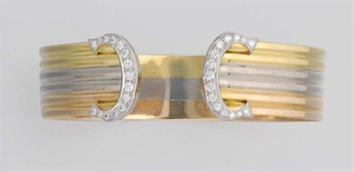 Lot 75 - Tricolor Gold and Diamond Bangle