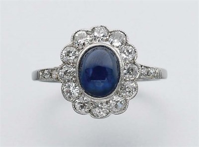Lot 226 - Cabochon Sapphire and Diamond Ring