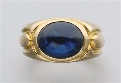 Lot 65 - Gold and Cabochon Sapphire Ring