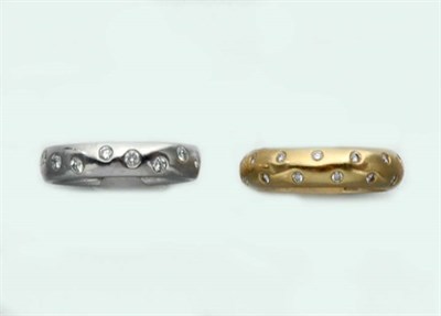 Lot 2420 - Two Platinum and Gold and Diamond Band Rings