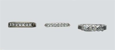Lot 2261 - Three Half-Around Diamond Band Rings