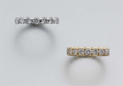 Lot 210 - Two Diamond Band Rings